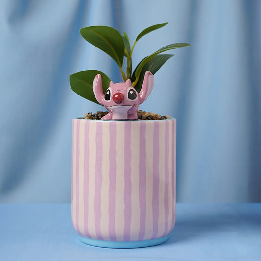 Schattige Disney Angel plantenpot met nep plant, ideaal als vrolijk en onderhoudsvrij cadeau voor Disney-fans of kinderkamers.
