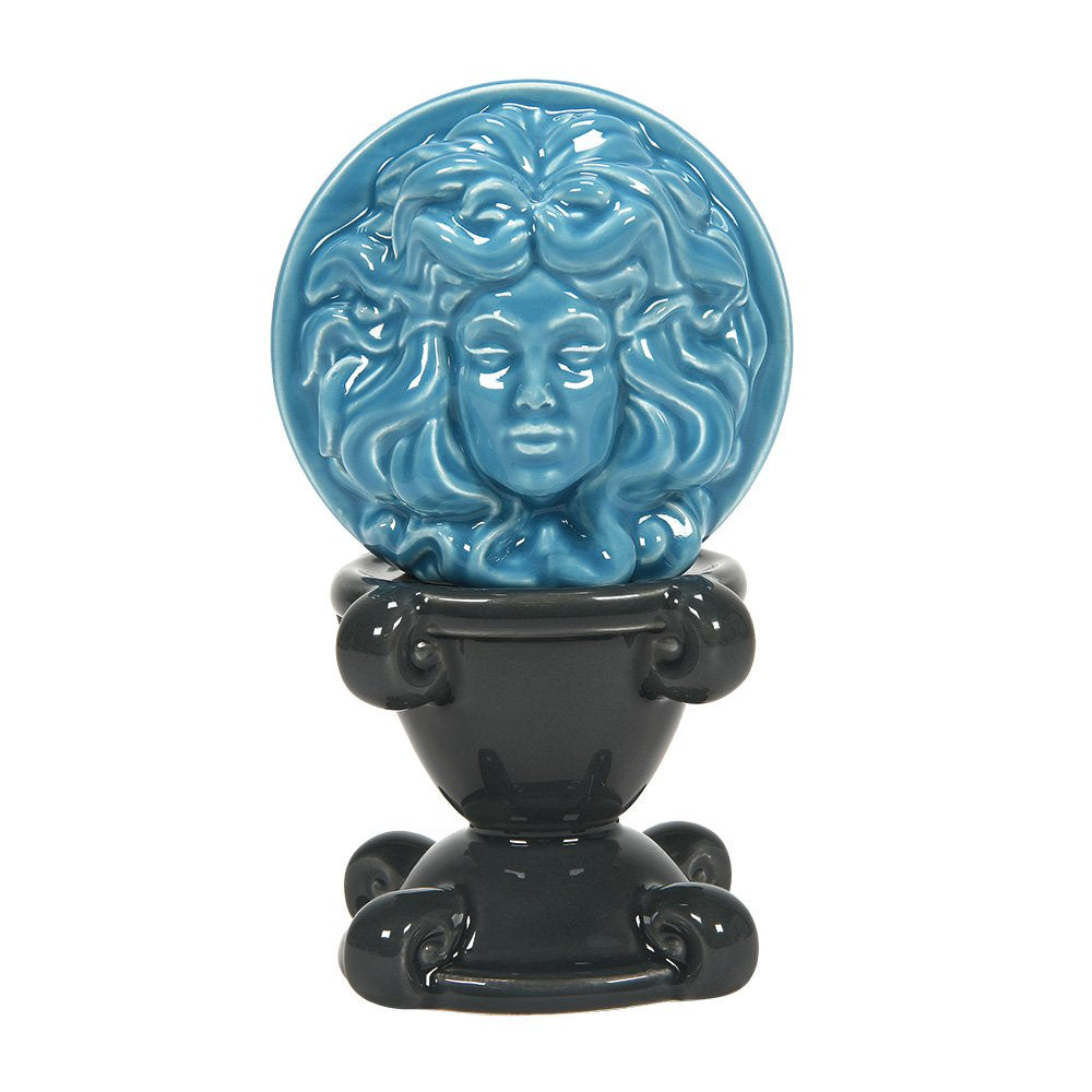 Keramische zout- en peperstrooierset van Madame Leota uit Disney’s Haunted Mansion, met gedetailleerd ontwerp en mysterieuze uitstraling.