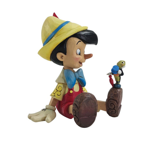 Disney Traditions Wishful and Wise beeld van Jim Shore, handbeschilderd Japie Krekel en Pinokkio verzamelbeeld uit de Disney-klassieker Pinokkio.