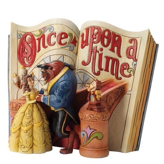 "Romantische Disney Storybook figurine met Belle en het Beest en de tekst 'Love Endures', symbool voor tijdloze liefde."