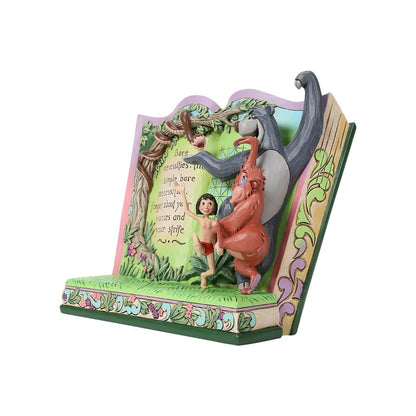 The Jungle Book Disney Traditions storybook figurine met Baloo en Mowgli in folk-art stijl van Jim Shore.
