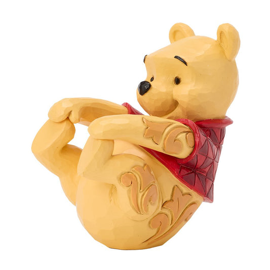 Winnie de Poeh Disney Traditions wobbler figurine, vrolijk wiebelbeeldje uit het Honderd Bunderbos.