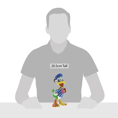 Romero Britto's kleurrijke Donald Duck beeldje, verpakt in een geschenkdoos – perfect voor Disney-verzamelaars.